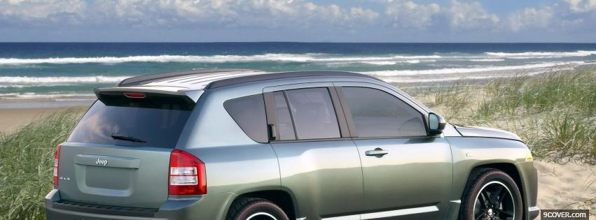 Photo jeep compass on the beach Facebook Cover for Free