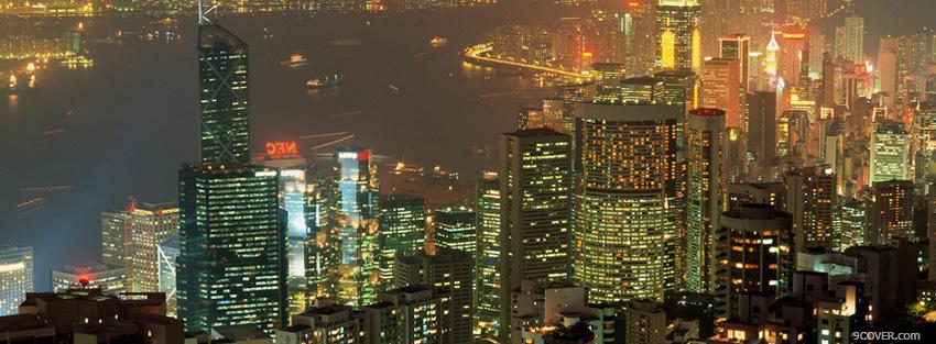 Photo the buildings in the city at night Facebook Cover for Free