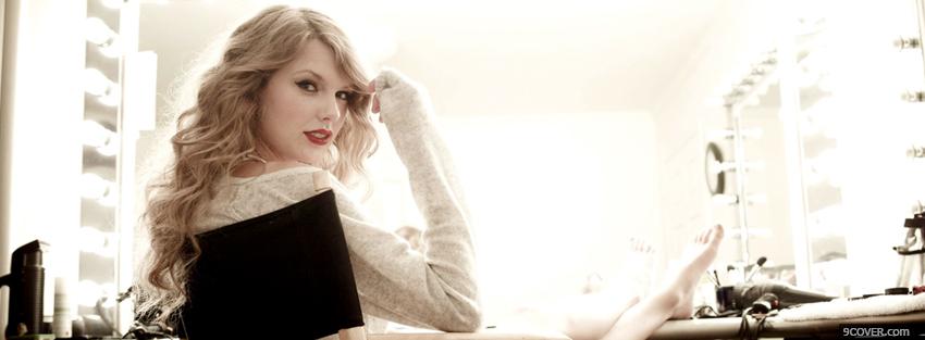 Photo taylor swift sitting music Facebook Cover for Free