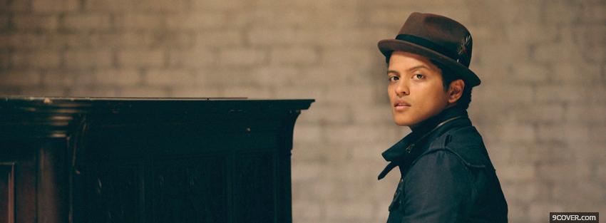 Photo bruno mars playing the piano Facebook Cover for Free