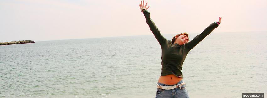 Photo jumping and ocean nature Facebook Cover for Free