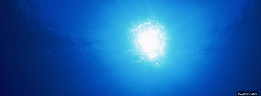 Photo sun reflecting in water Facebook Cover for Free