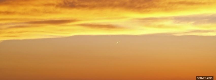 Photo sunset on clouds nature Facebook Cover for Free