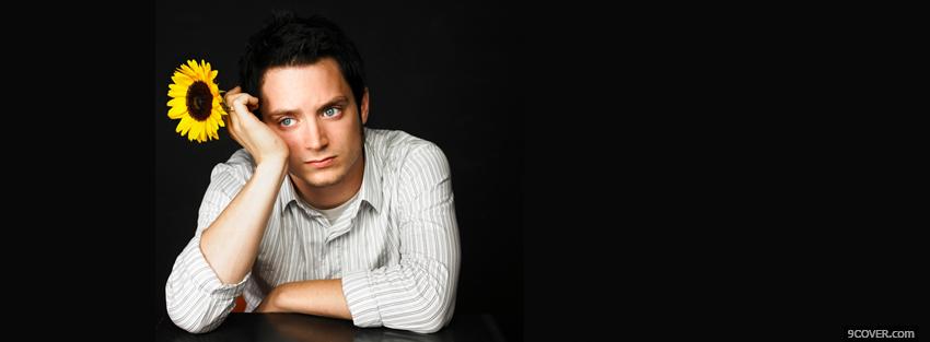 Photo elijah wood with flower Facebook Cover for Free